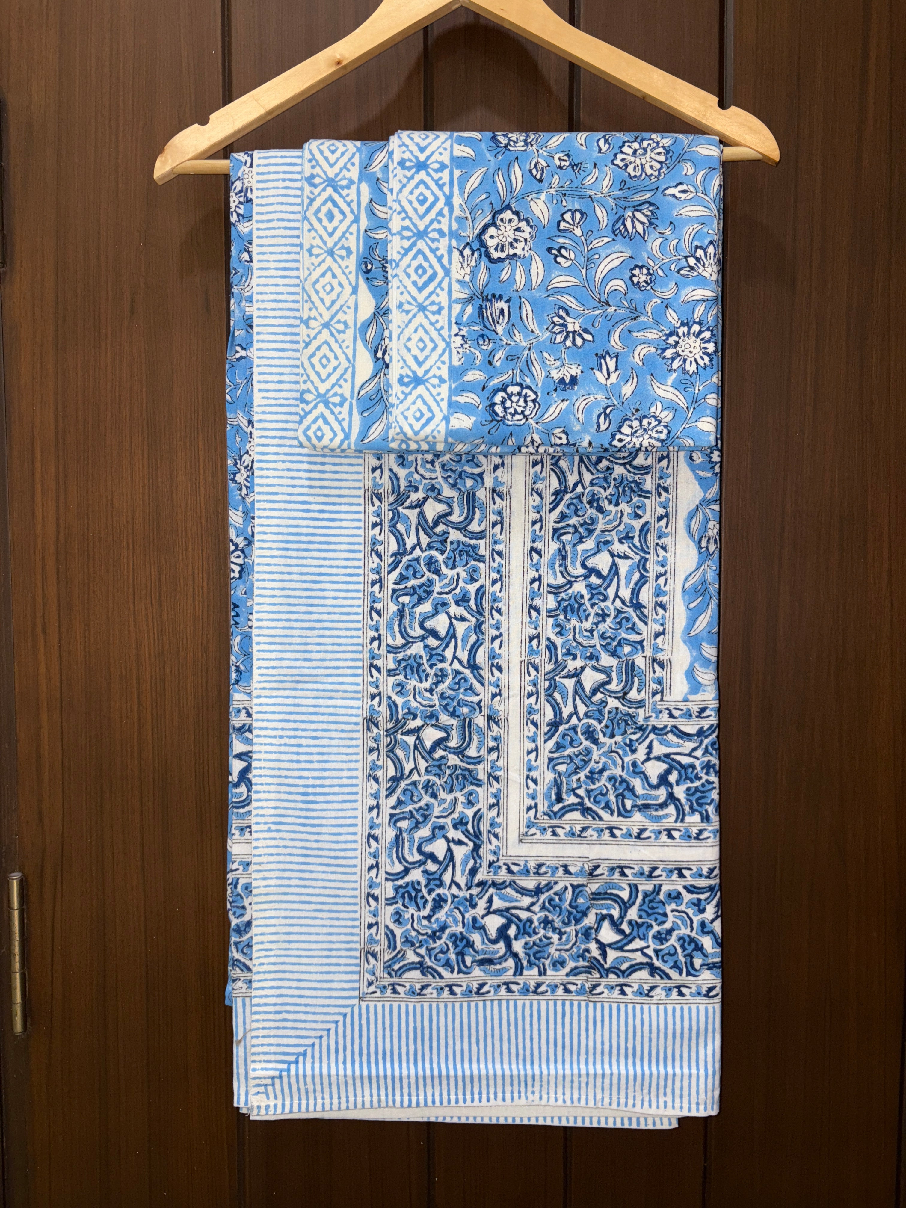 Blue and white patterned bedsheet 